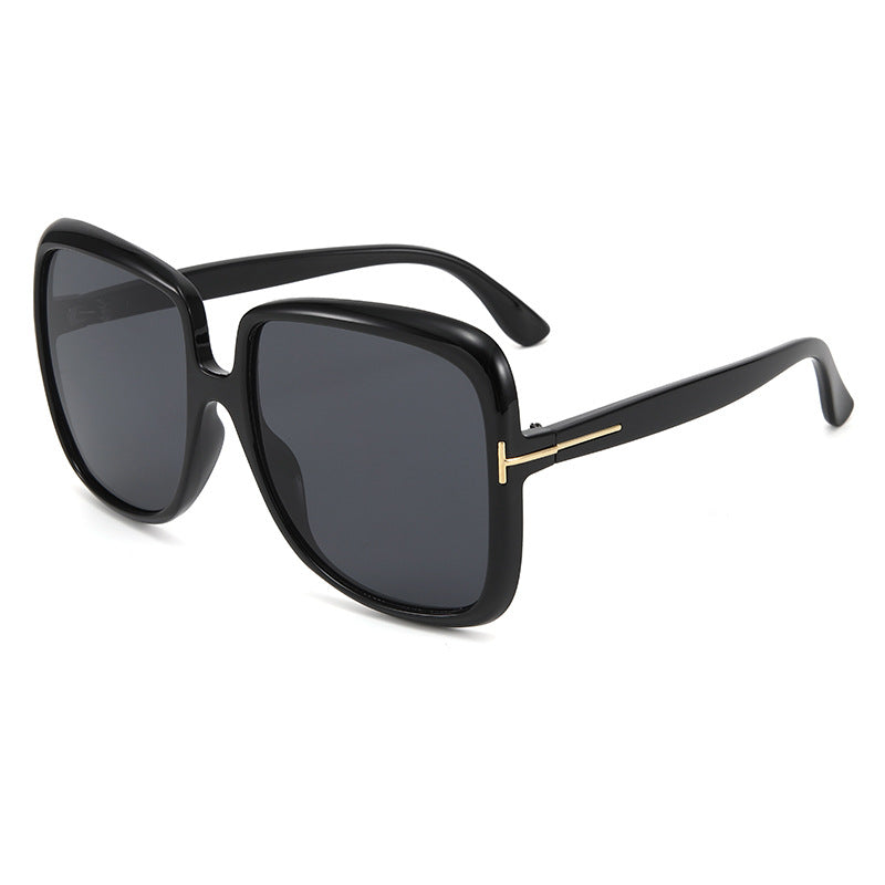 Dame elegant oversized solbrille med filigranramme Skanto