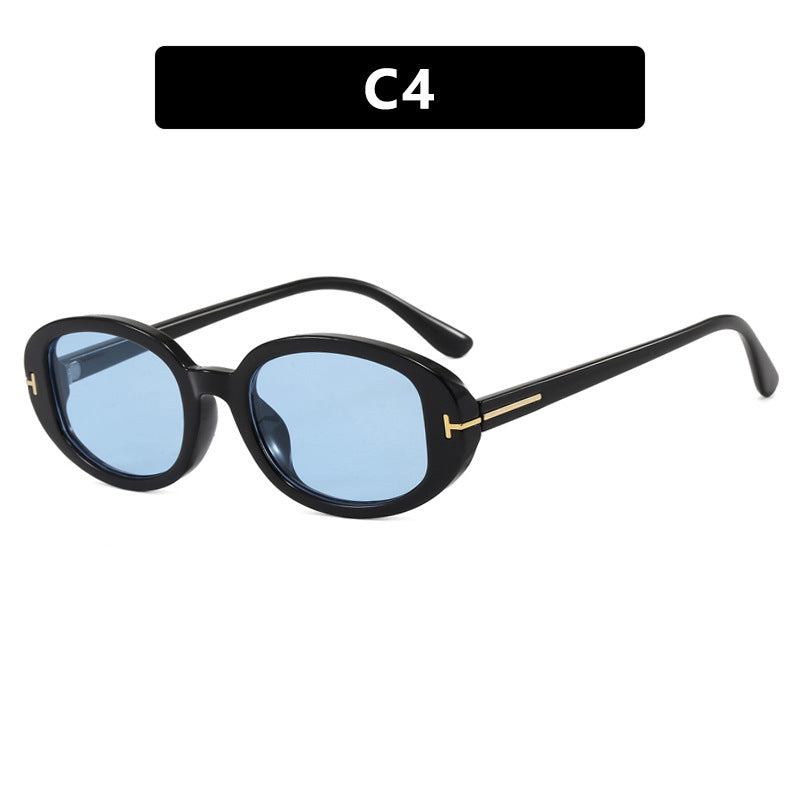 Women's stylish oval sunglasses with golden details Skanto