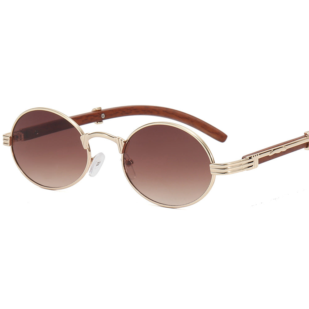 Dame rund designer solbrille med innovativ metallramme Skanto
