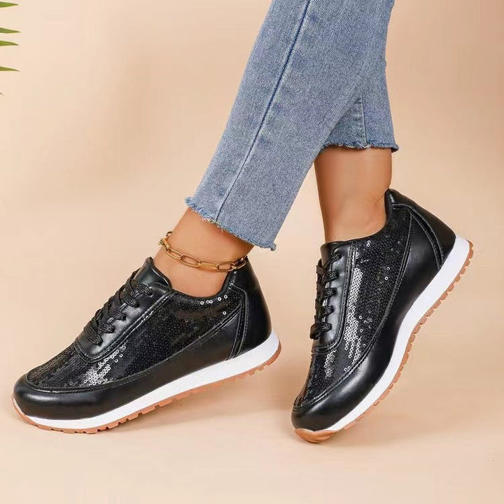 Dames fashionable sneakers med skimrende overmateriale og skli-resistent såle Skanto