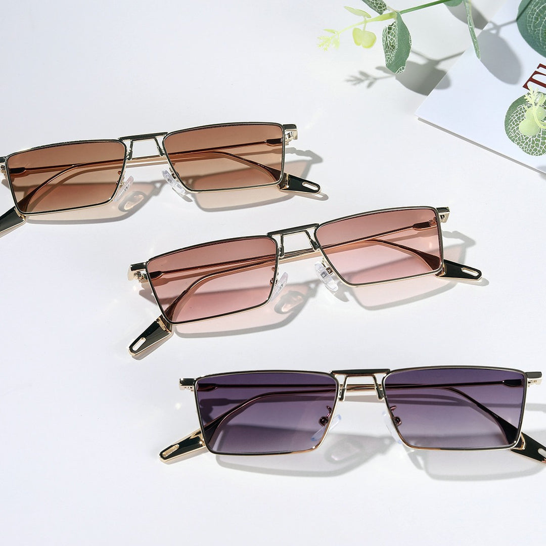 Dame elegant geometrisk solbrille med stilig metallramme Skanto
