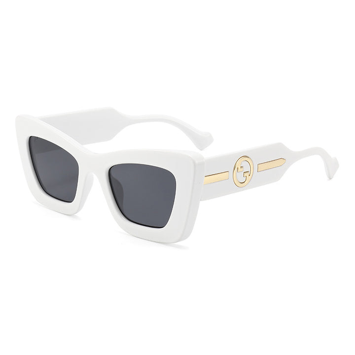 Dame designer solbrille med markant geometrisk ramme og høy kvalitet utførelse Skanto