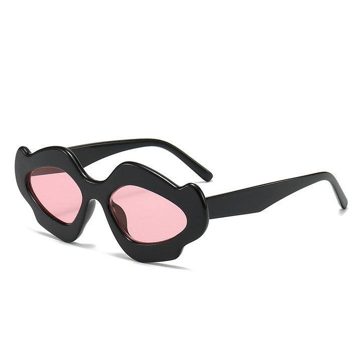 Dame moteriktig solbrille med unik blomsterramme Skanto