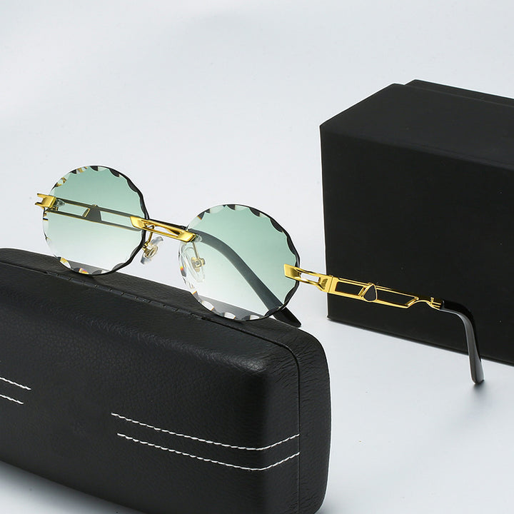 Dame rund solbrille med unikt bølgedesign og høykvalitets metallramme Skanto