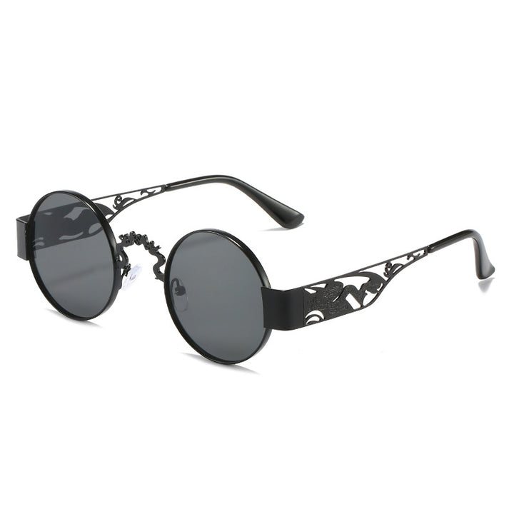 Dame kunstnerisk rundt solbrille med elegant filigranramme Skanto