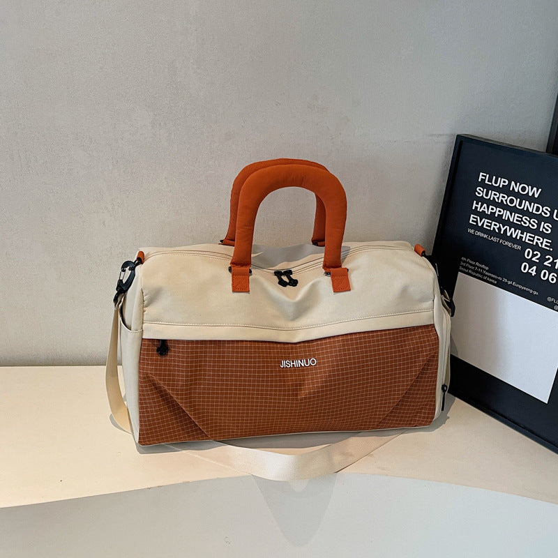 Sporty fritids-duffelbag med ergonomiske håndtak og flere rom Skanto