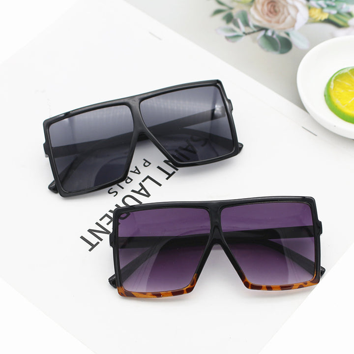 Dame oversized solbriller i trendy geometrisk design Skanto