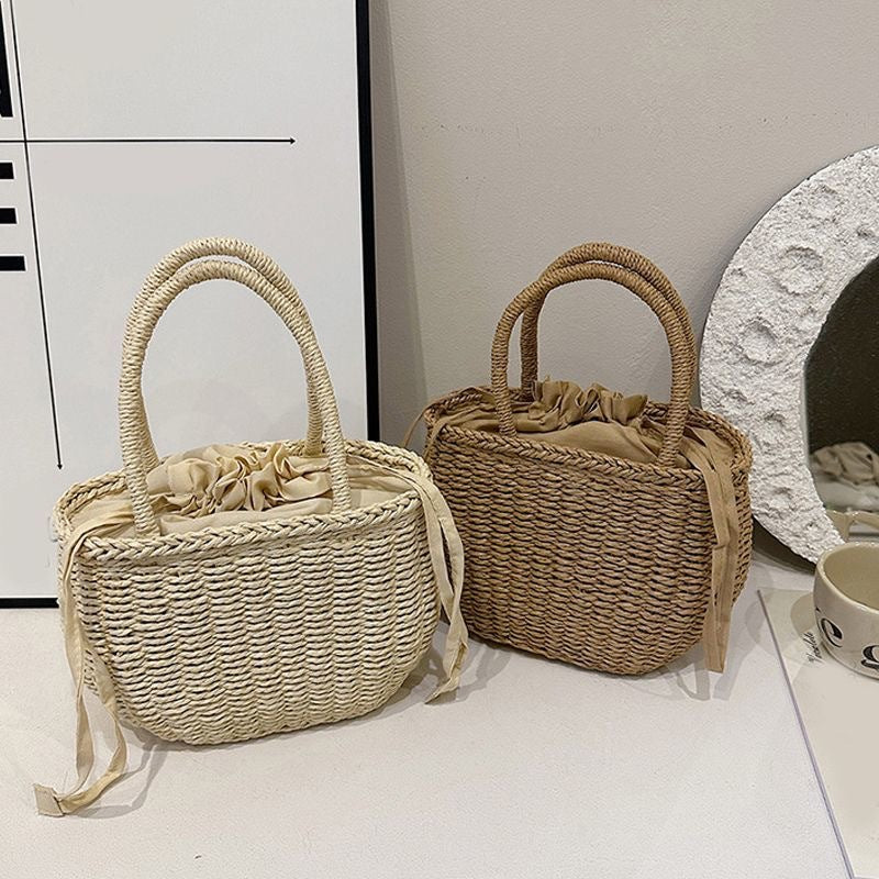 Håndvevd kurvveske med elegant sløyfe Skanto