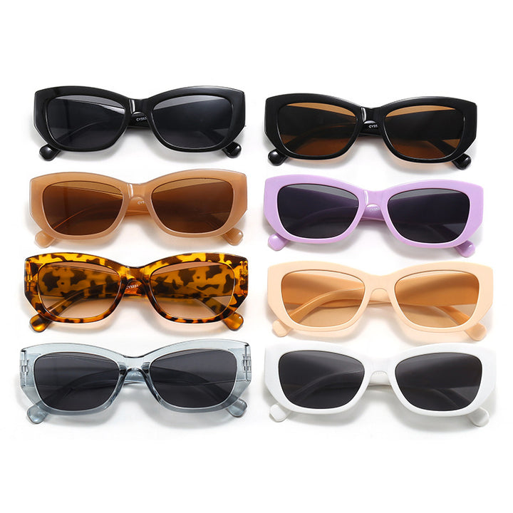 Dame moderne Cat-Eye solbriller laget av robust plast Skanto