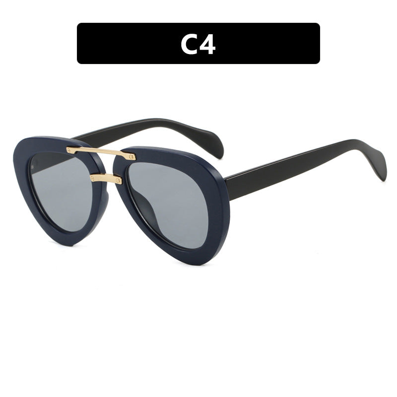 Women's extravagant sunglasses in modern heart design Skanto