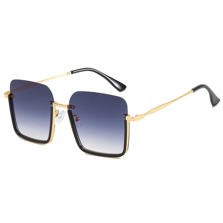 Dame oversized solbrille med elegant geometrisk ramme Skanto