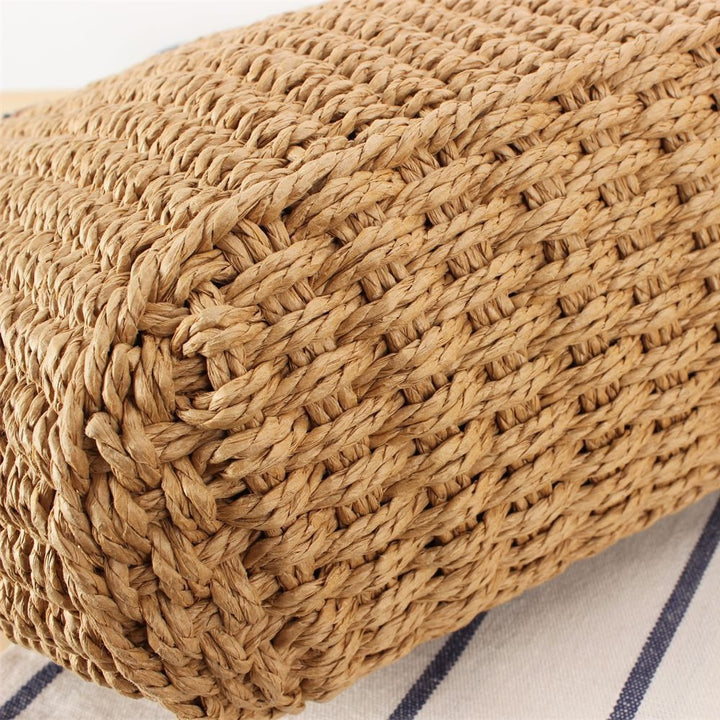 Beach bag made of hand-woven natural material with sturdy leather straps Skanto