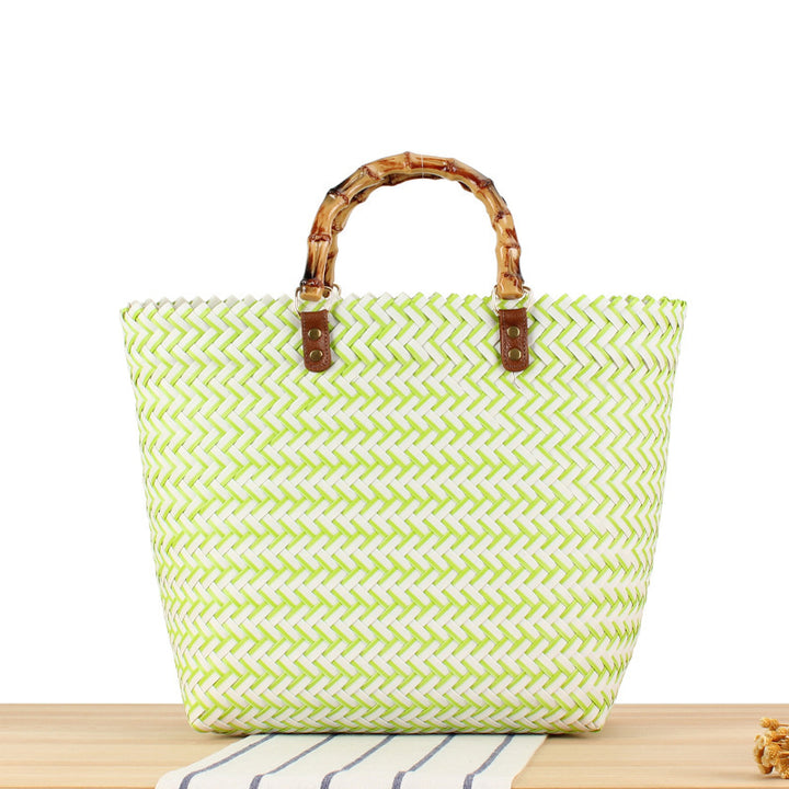 Handbag made of high-quality, braided material with bamboo handle Skanto