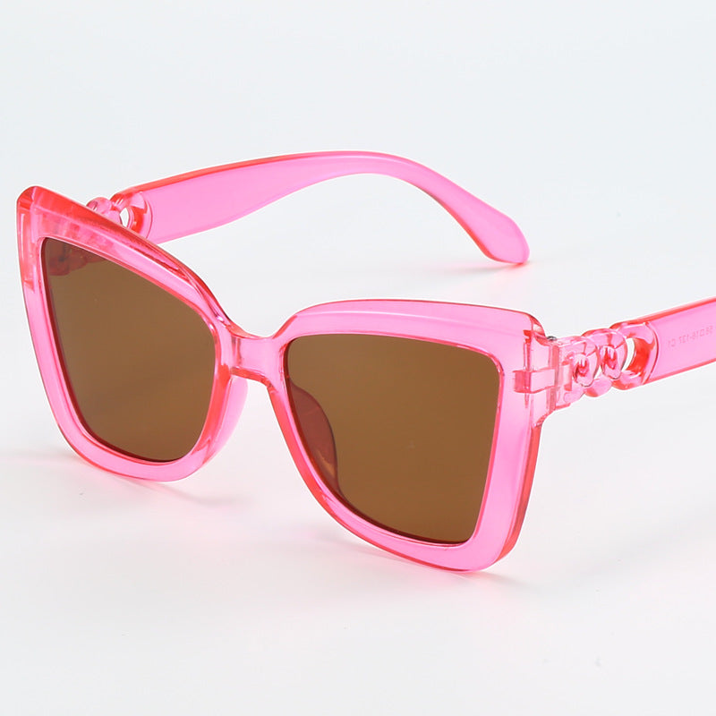 Dame moderne Cat-Eye solbriller med klar ramme og UV-beskyttelse Skanto