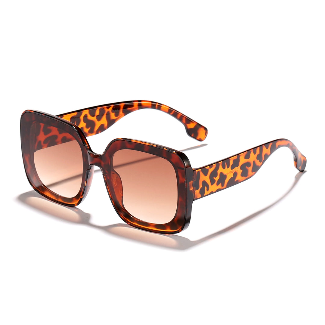 Dame firkantet solbrille med innovativt transparent rammedesign Skanto