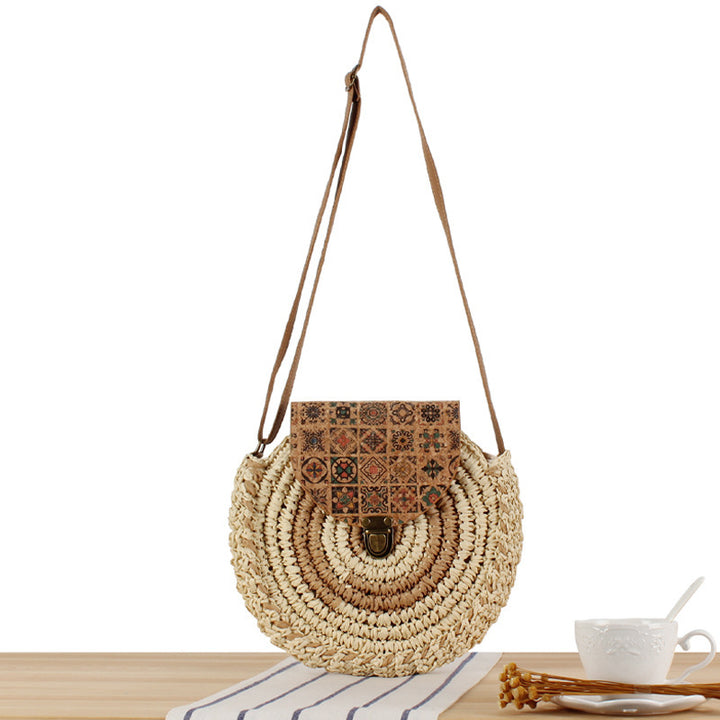 Rund bast- skulderveske med unikt klaffelukking Skanto