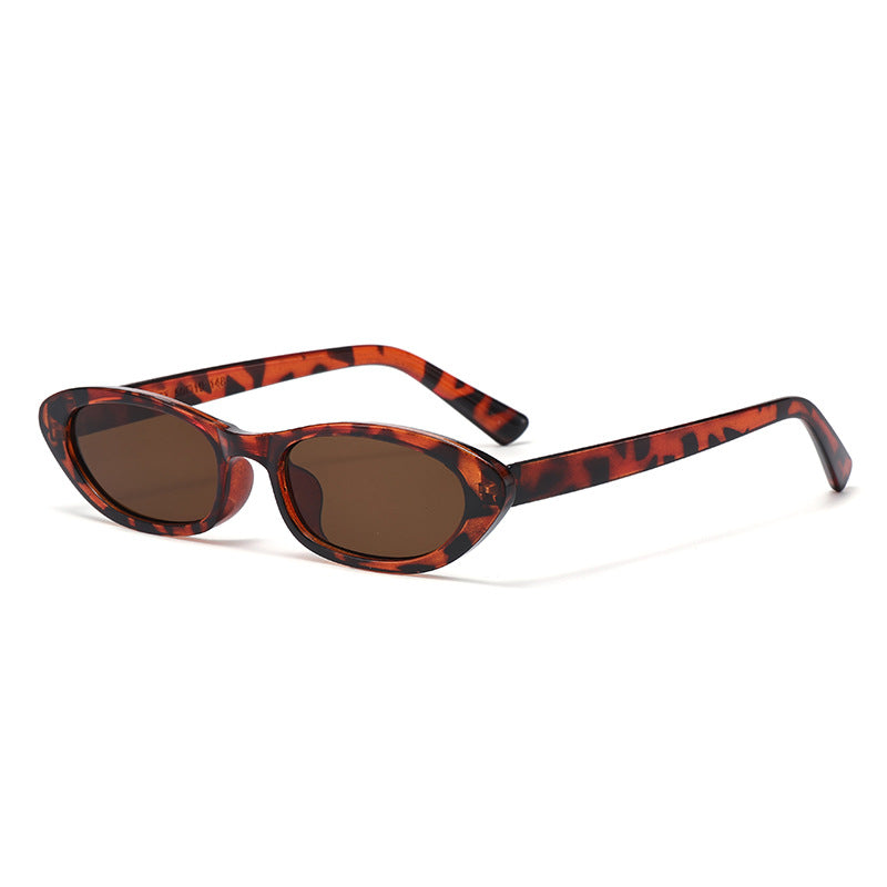 Dame Cat-Eye solbrille med beskyttende UV-filter og elegant rammestruktur Skanto