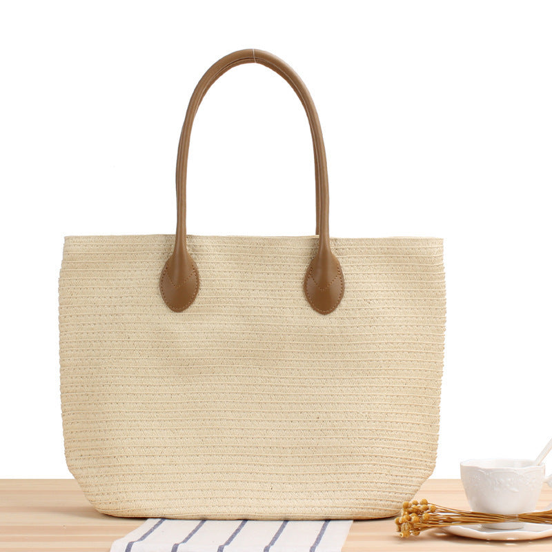 Spacious straw shopper with leather handles Skanto