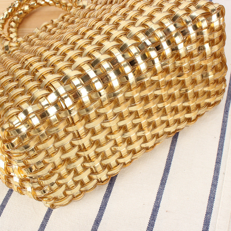Handbag made of woven natural material with elegant accents Skanto