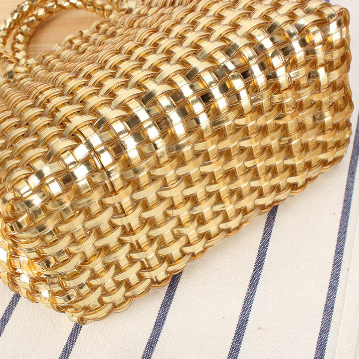 Handbag made of woven natural material with elegant accents Skanto