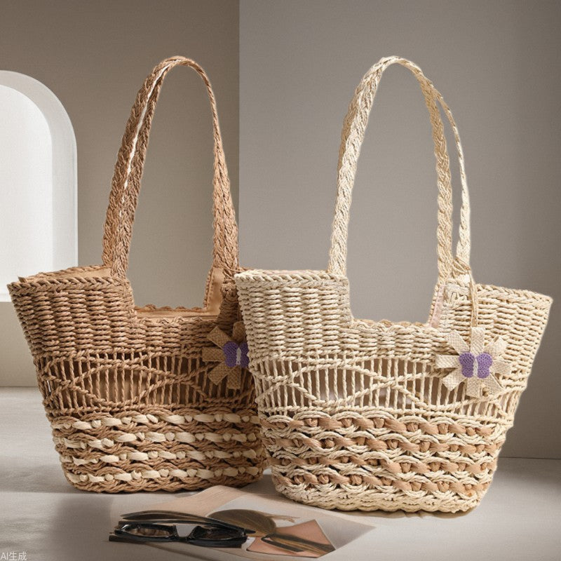 Braided basket bag with decorative floral appliqué Skanto