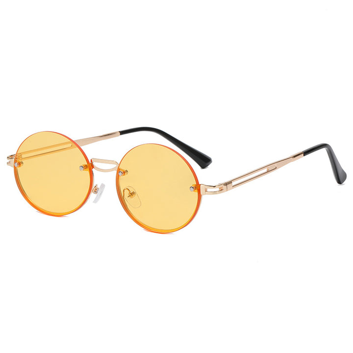 Dame rund solbrille med fin metallramme Skanto