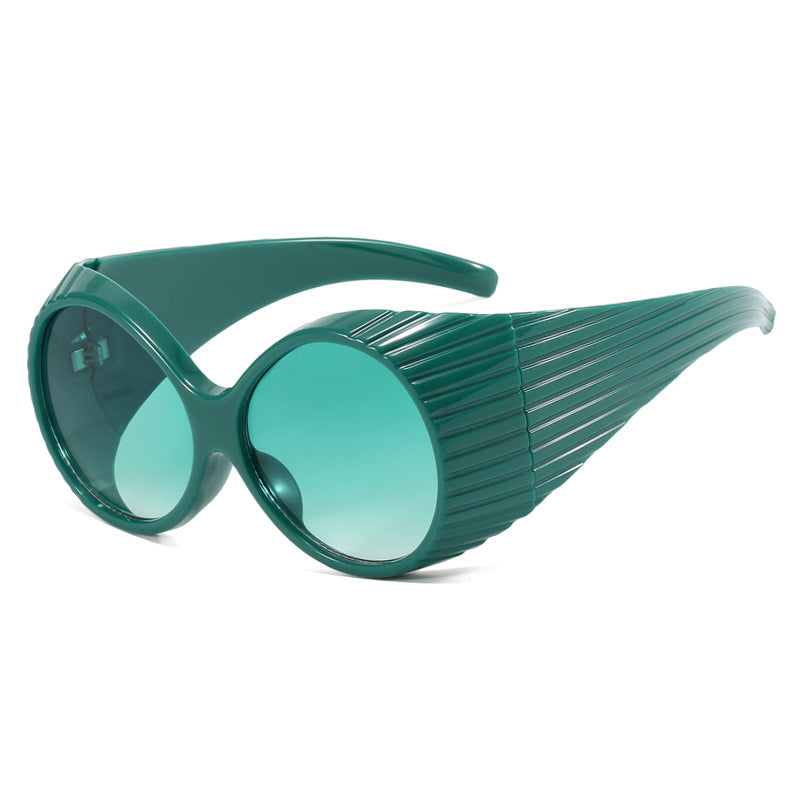 Women's extravagant sunglasses with curved frame Skanto