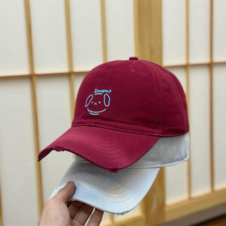 Kvinnenes uformelle karakterbroderte baseballcapper Skanto