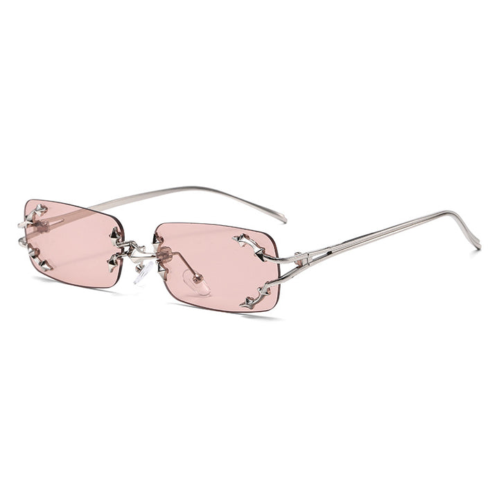 Dame moteriserte solbriller med filigran metallramme og transparente glass Skanto