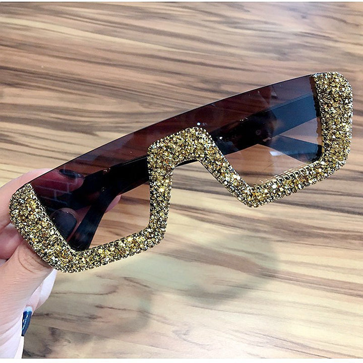 Dame elegant glitter-solbriller med markant ramme Skanto