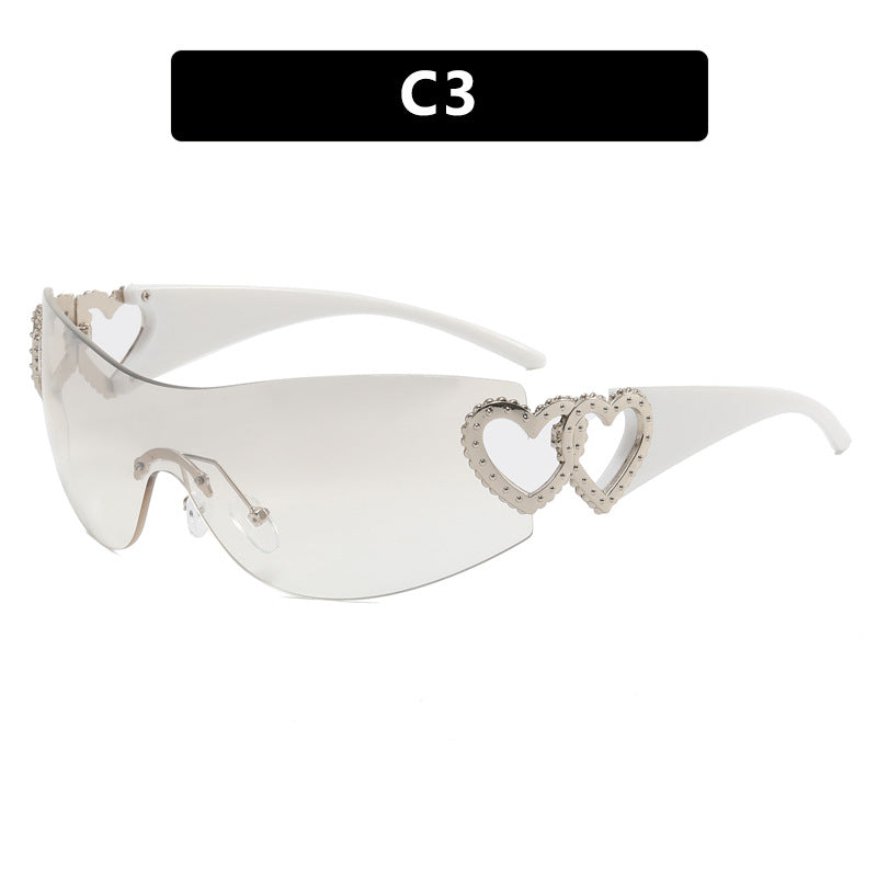 Dame Fashion-solbrille med hjerte-applikasjoner Skanto