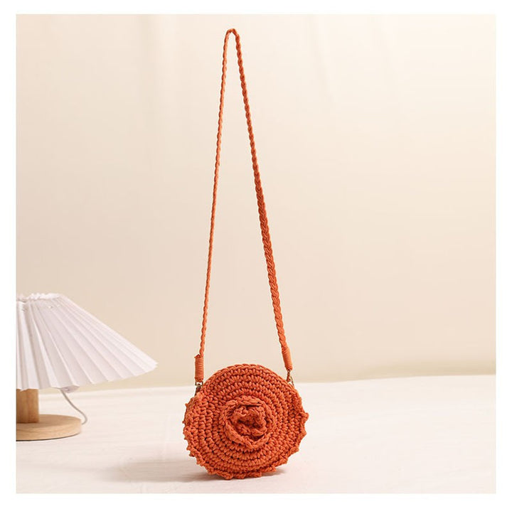 Hand-crocheted crossover bag with floral details Skanto