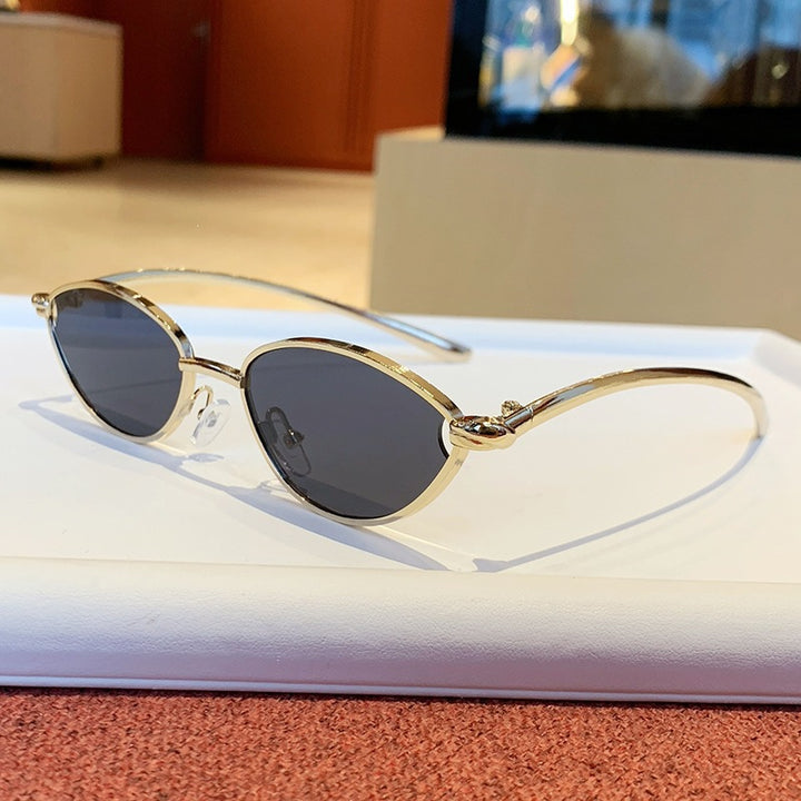 Women's Designer Sunglasses with Elegant Metal Frame and Protective Lenses Skanto