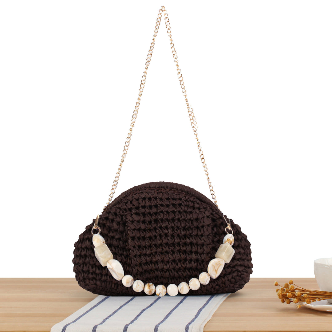 Um backpack med dekorativt skjell-design Skanto