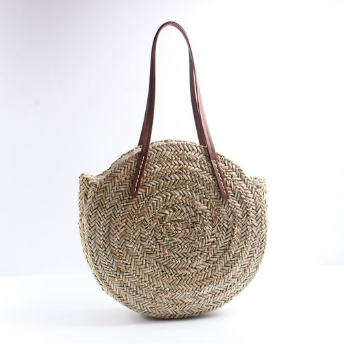 Braided straw beach bag with elegant leather handles Skanto