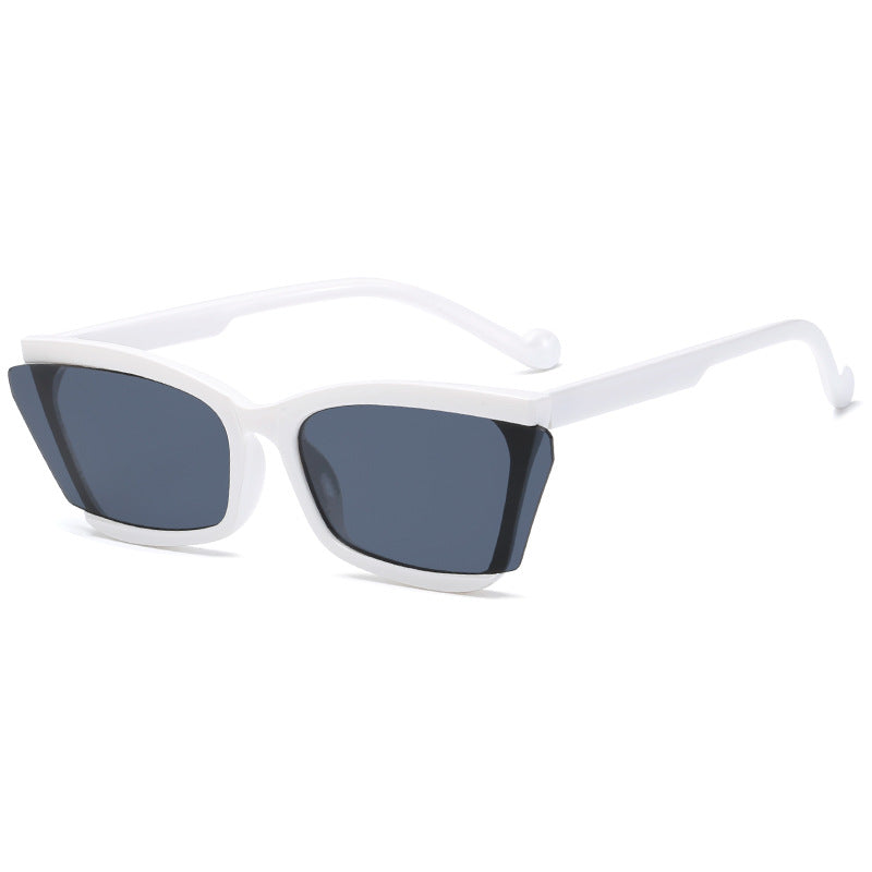 Dame moteriktig solbrille med unikt rektangulært design og UV-beskyttelse Skanto