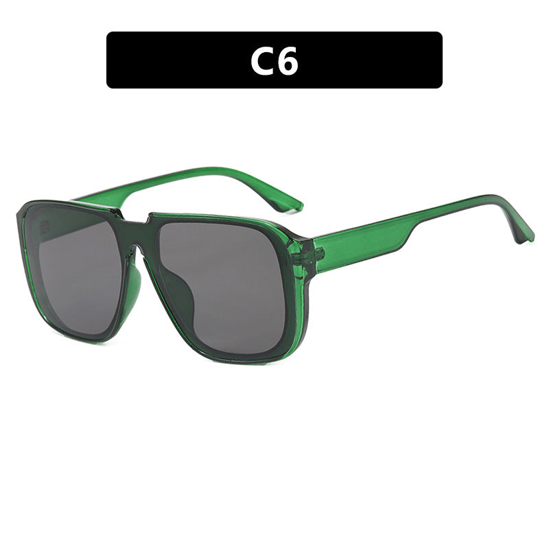 Women's trendy square sunglasses with transparent green frame and protective UV filter Skanto
