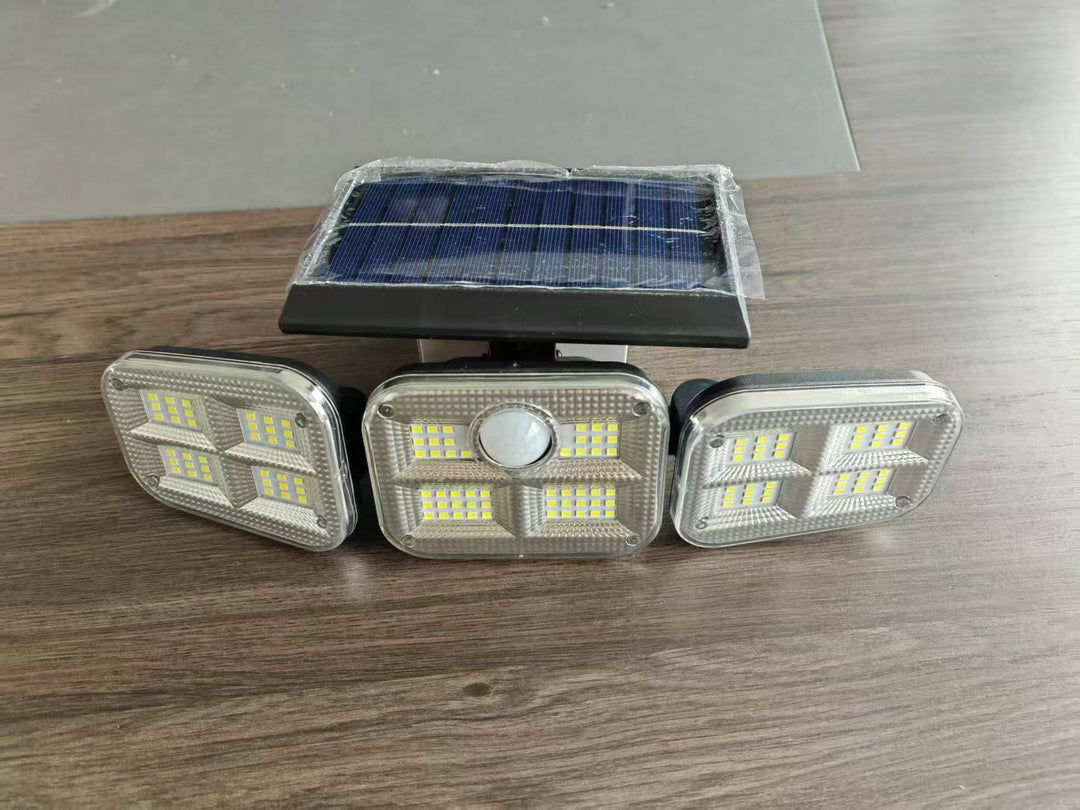 Utendørs solenergi trippehode LED sikkerhets flomlys med PIR bevegelsessensor og justerbare svingemonter Skanto