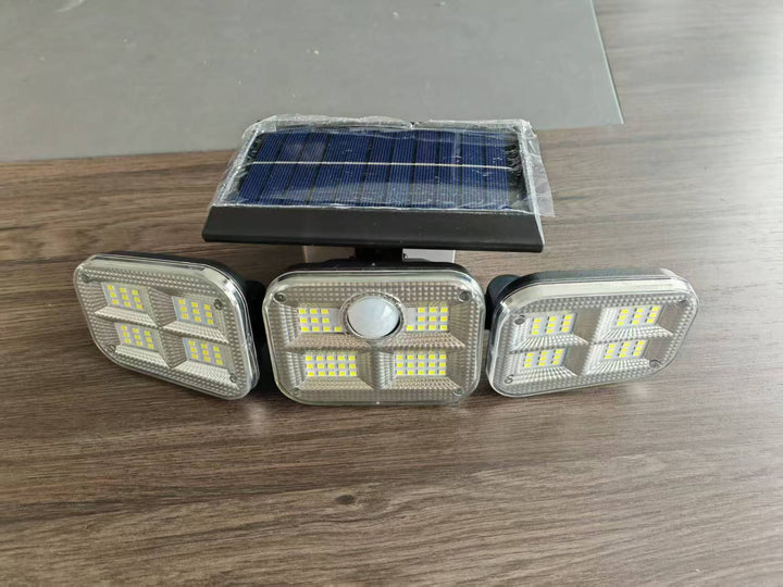 Utendørs solenergi trippehode LED sikkerhets flomlys med PIR bevegelsessensor og justerbare svingemonter Skanto
