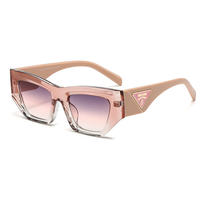 Dame Designer solbrille med moderne, geometrisk ramme Skanto