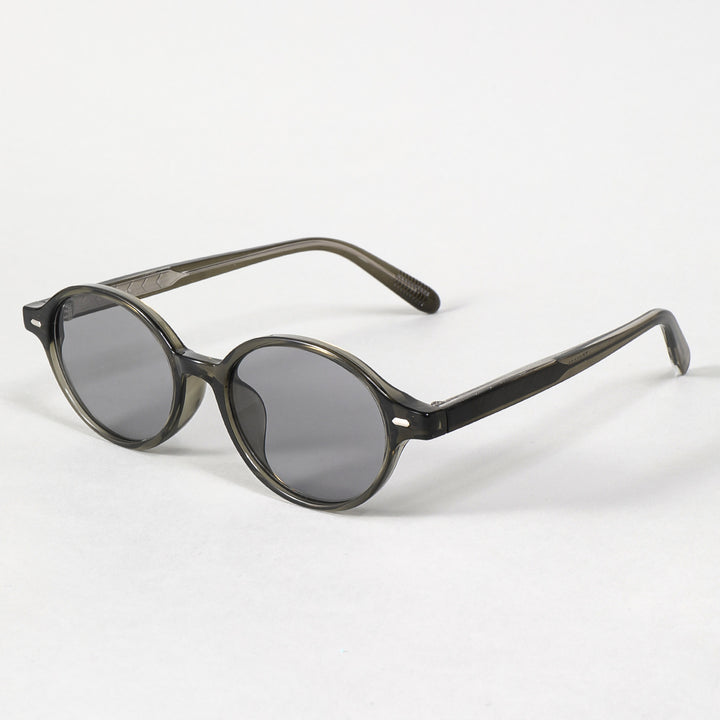 Dame moteriktig solbrille i oval design med stilige detaljer Skanto