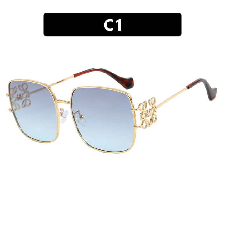 Women's square sunglasses with filigree design and luxurious metal frame Skanto