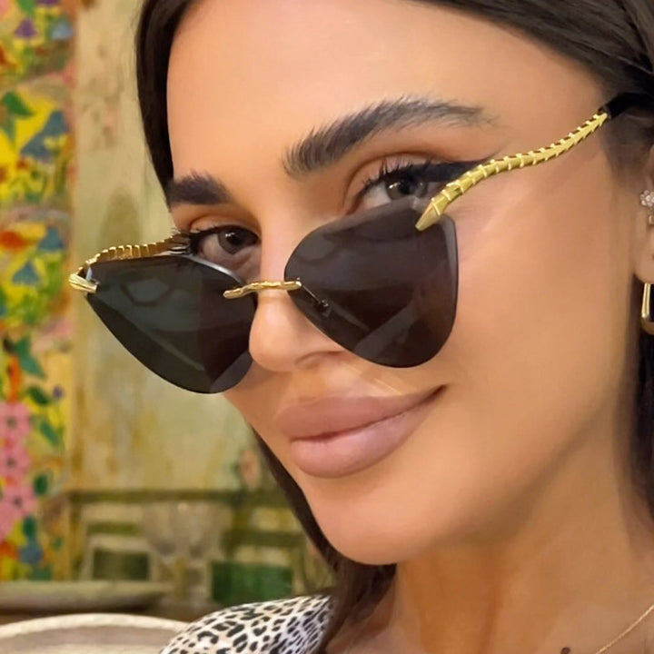 Women's Cat-Eye Sunglasses with Unique Gold Frame Design and Protective Lenses Skanto