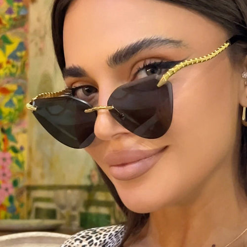 Women's Cat-Eye Sunglasses with Unique Gold Frame Design and Protective Lenses Skanto