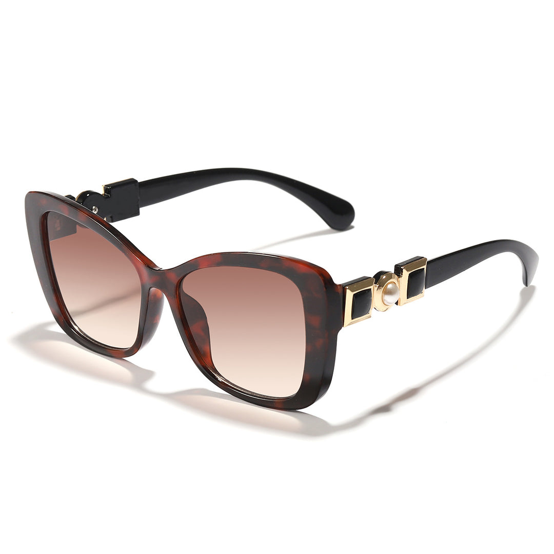 Dame Cat-Eye solbriller med elegant metallisk dekorasjon Skanto