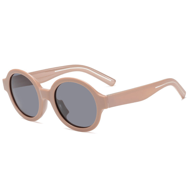 Dame moteriktig solbrille i stilfullt rundt design Skanto