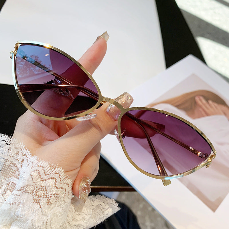 Dame Cat-Eye solbriller med elegant metallramme og UV-beskyttelse Skanto