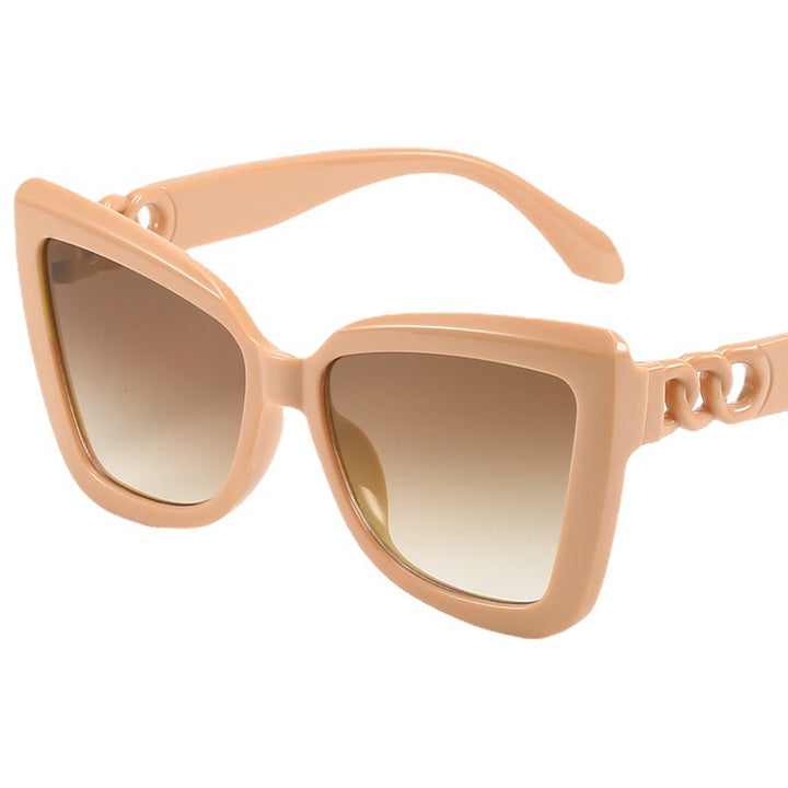Dame moderne Cat-Eye solbriller med klar ramme og UV-beskyttelse Skanto