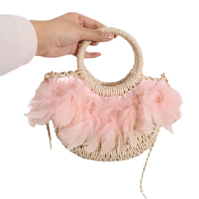 Elegant basket bag with delicate feather details Skanto