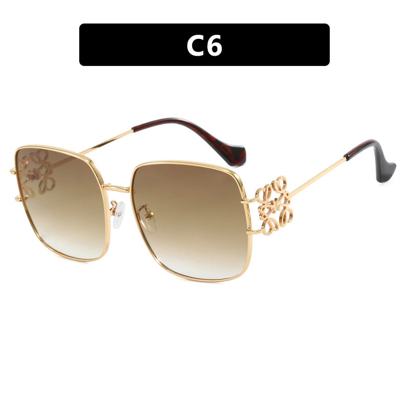 Women's square sunglasses with filigree design and luxurious metal frame Skanto